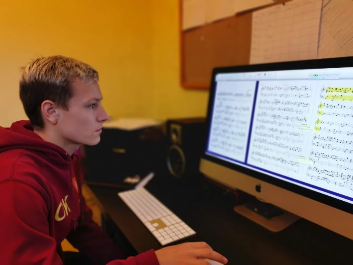Oliver in a gcse class learning sibelius software
